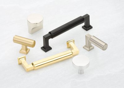 Nickel and brass custom hardware for custom designed walk-in closets.