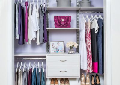 Custom shelving, drawers, and storage ideas for entry or hallway closet.