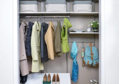 Custom shelving and storage ideas for entry or hallway closet.